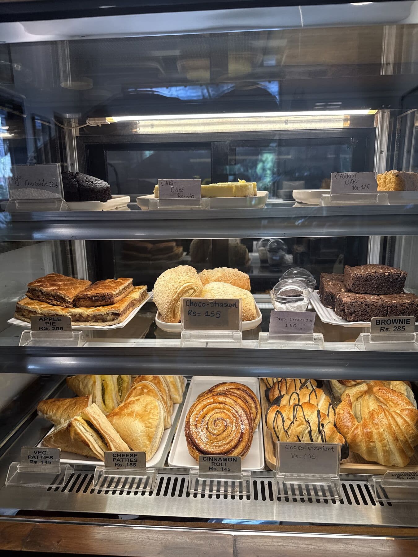 The bakery case: pies, brownies, croissants and cinnamon rolls